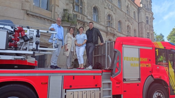Mitglieder der AG FRO auf dem Feuerwehrtag - v.l.: Werner Backeberg, Leyla Hatami, Anja Sander und Brian Baatzsch